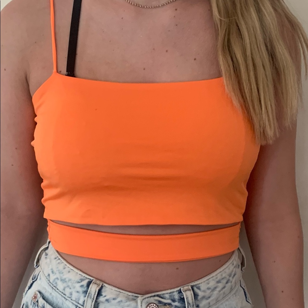 Bright orange shein top with stomach opening